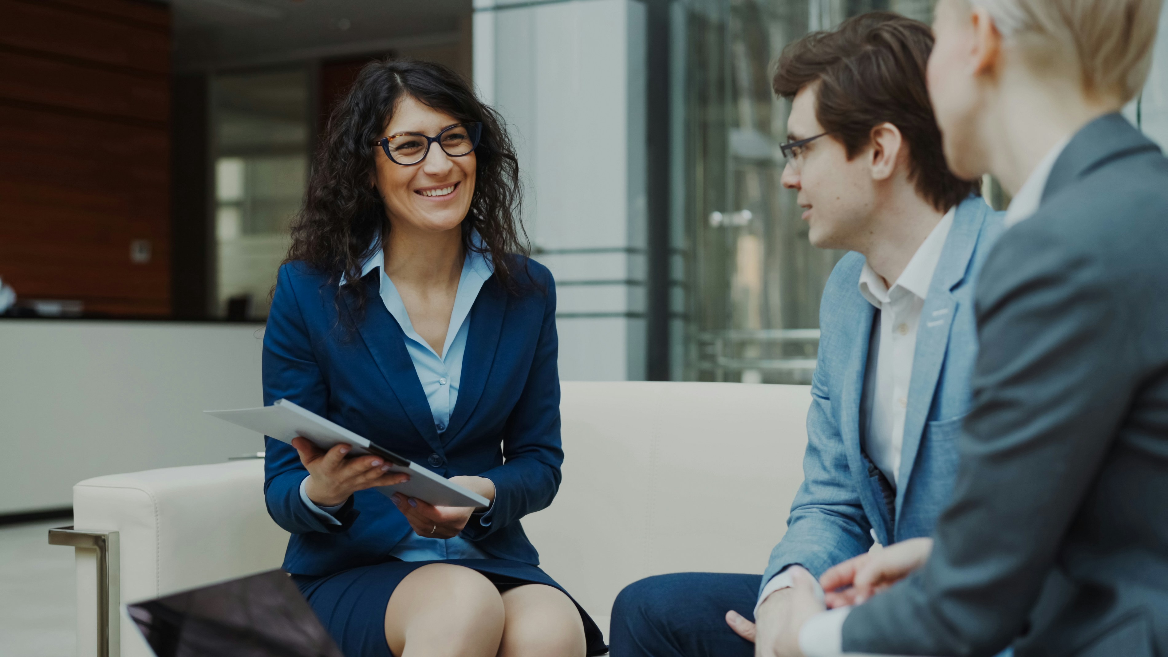 Business partners discussing insurance services